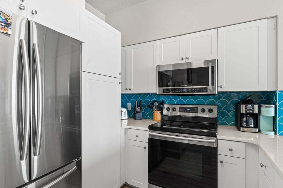 Bright, functional, and well‑designed, this kitchen is perfect for vacation living.