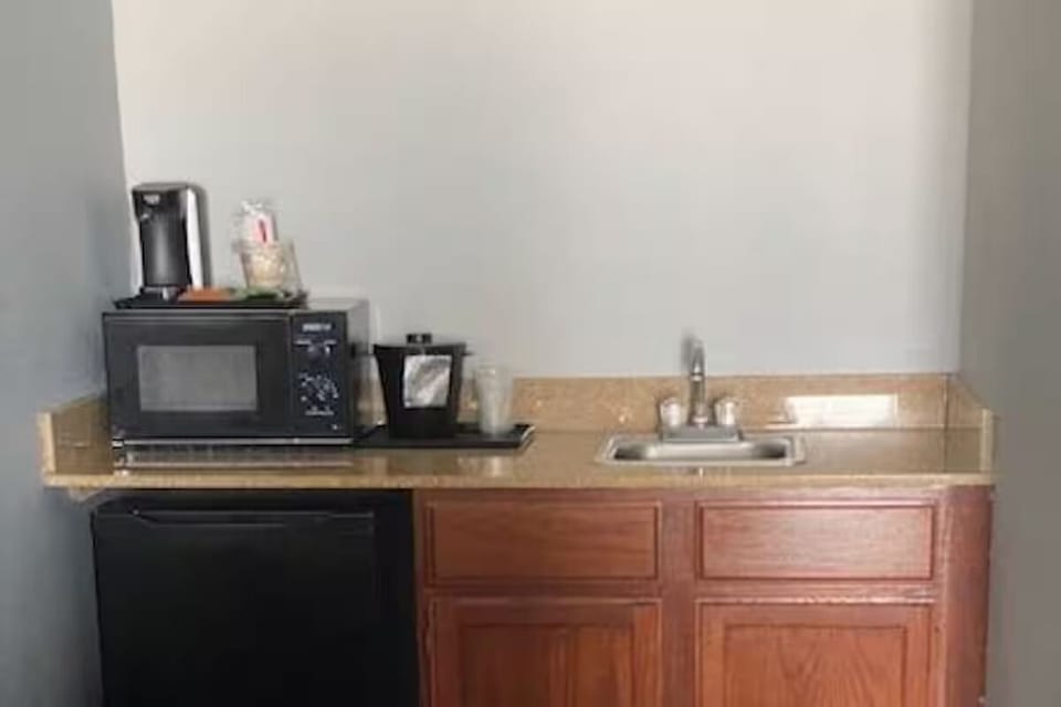 Start mornings easily with microwave, coffee, and handy sink.
