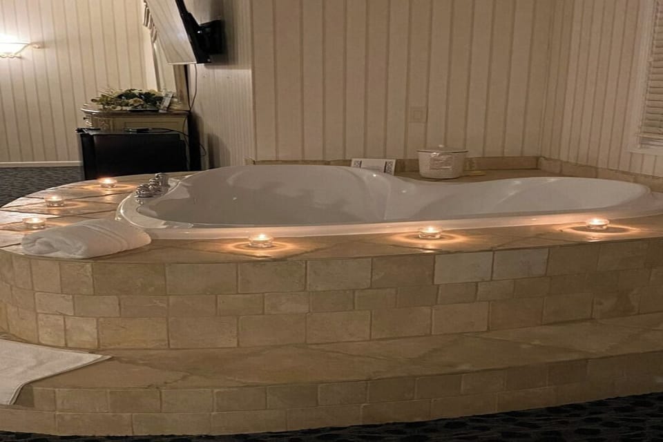 Soak in candlelit bubbles for a truly indulgent escape.