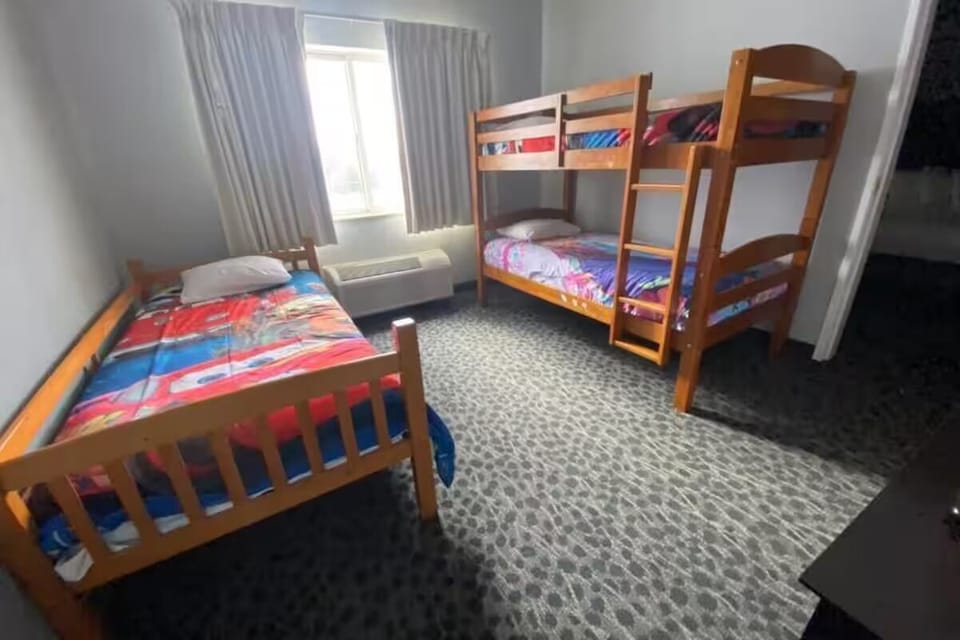 Make family memories with fun bunk beds and cozy singles.