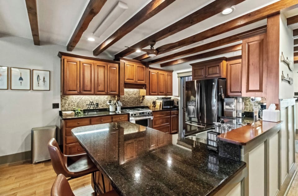 Well stocked kitchen with gas stove.