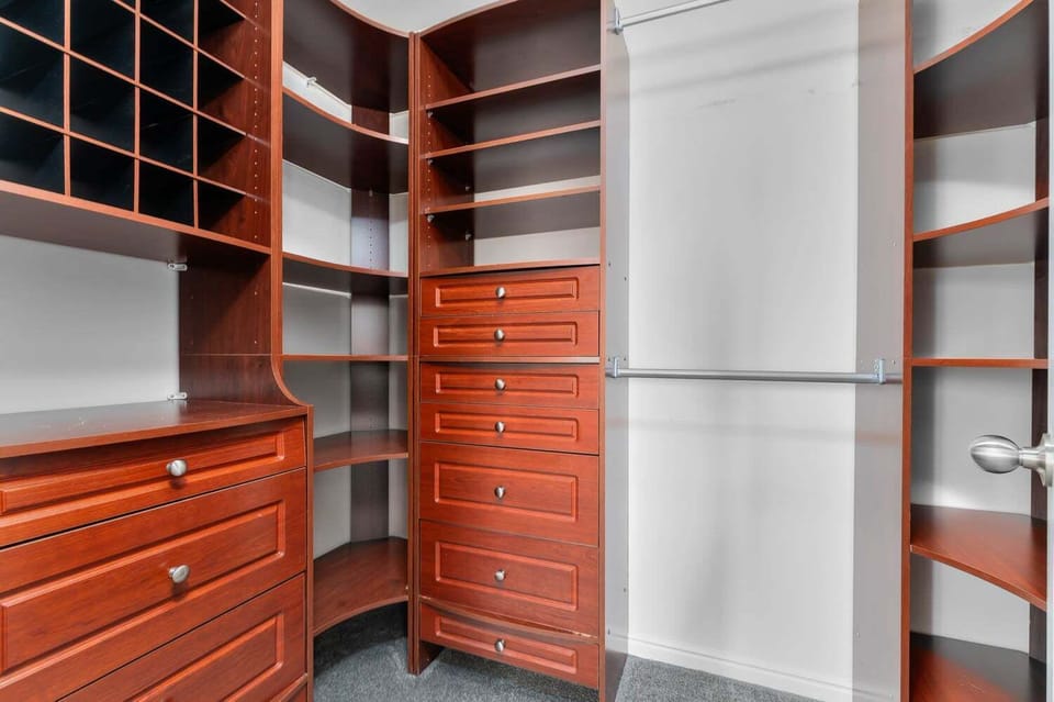 Unpack and actually stay a while — the custom walk-in closet gives everyone space to spread out