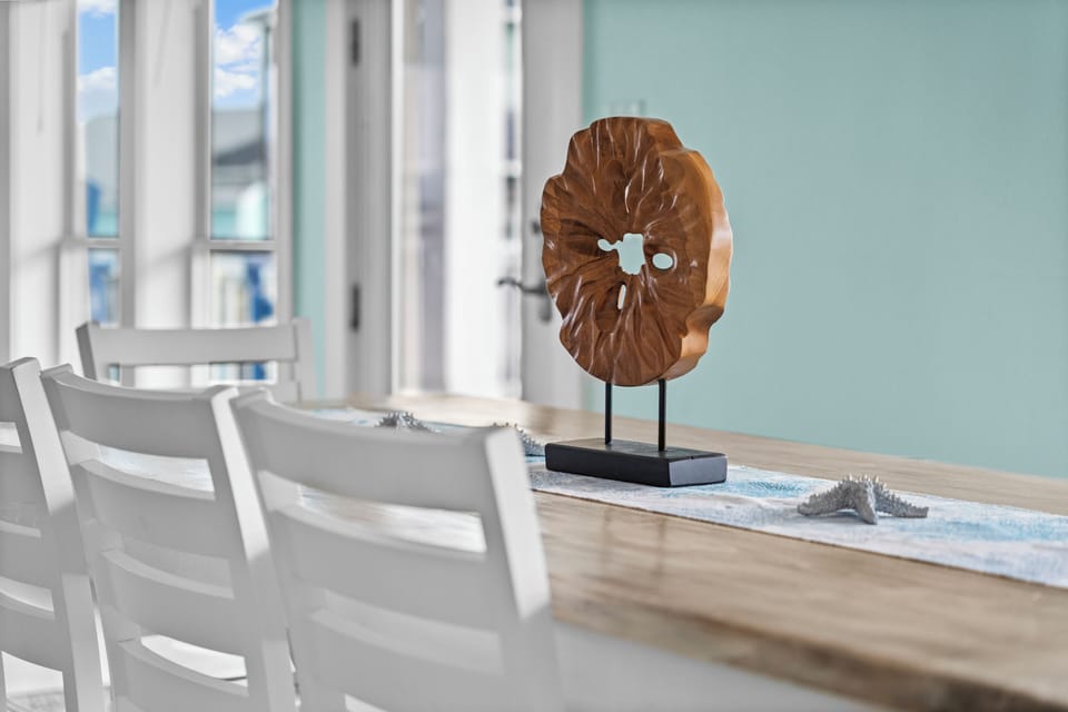 Bright, open dining room with modern coastal decor.