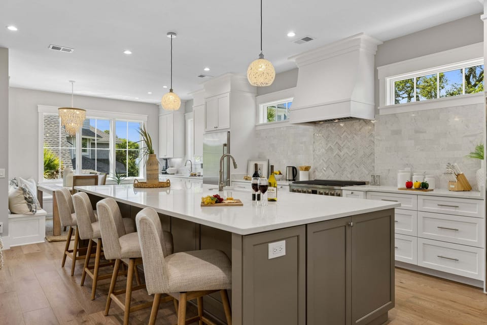 The heart of the home is this stunning chef-inspired kitchen, where luxury meets functionality.