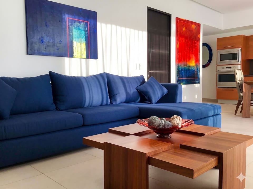 Deluxe Apartment | Living area | 60-inch LED TV with cable channels