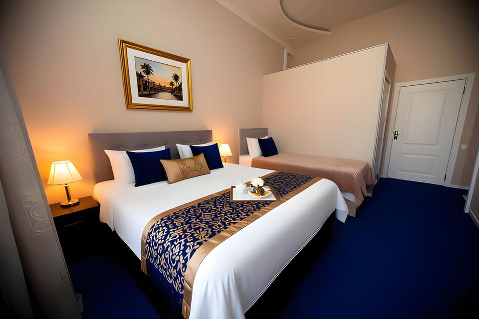Deluxe Triple Room, Balcony | In-room safe, desk, soundproofing, iron/ironing board