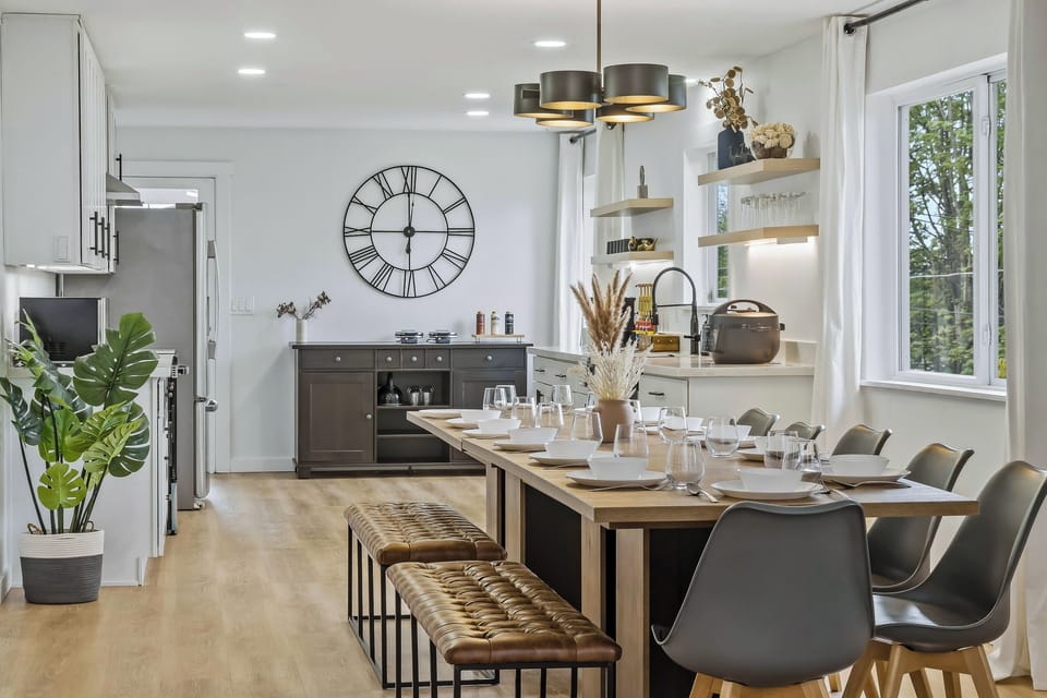 Open kitchen and spacious dining area, perfect for gathering.