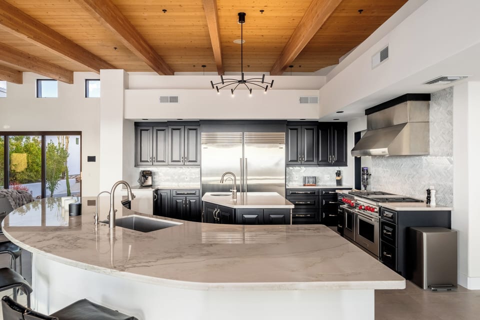 Fully equipped kitchen with expansive island for entertaining