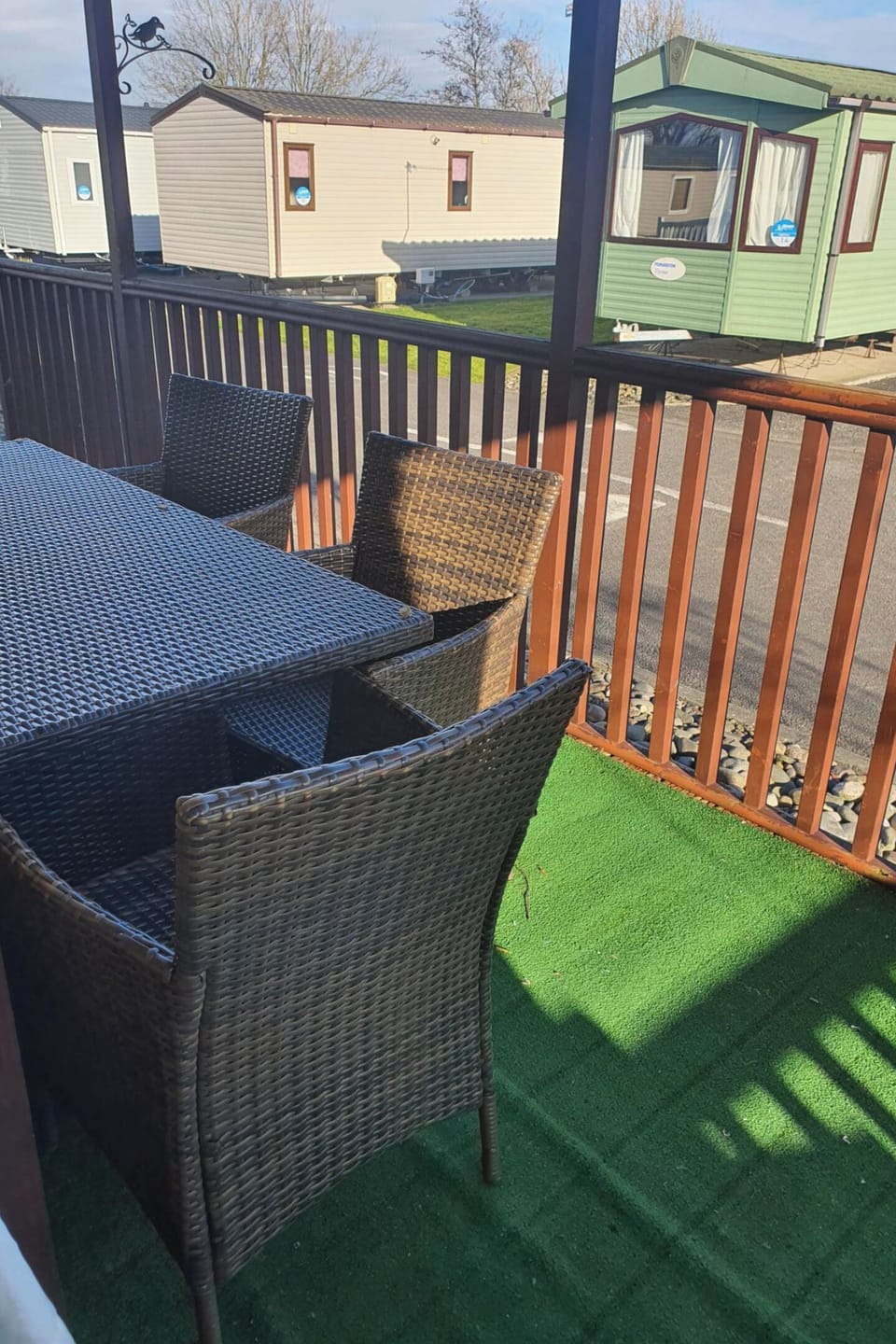 Decking and rattan dining set