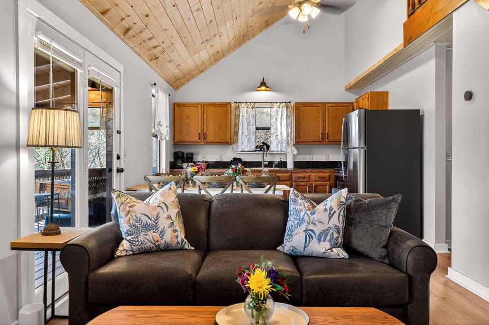 Relax on the sofa while you enjoy views from the living area, or fireplace.