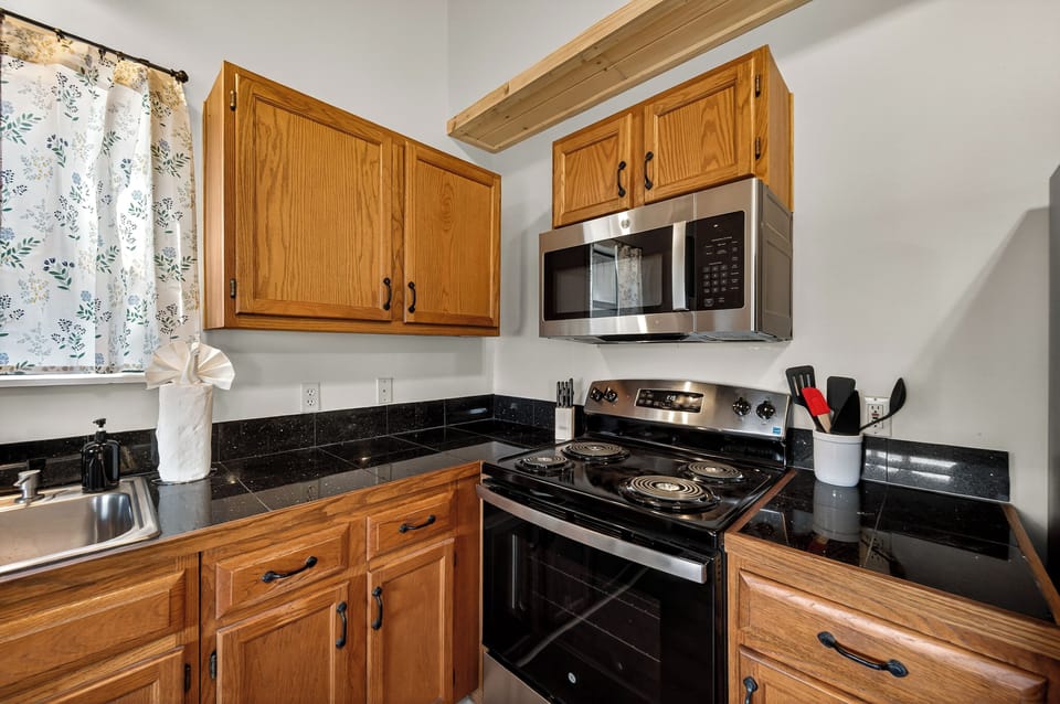 Fully equipped kitchen has everything you need for meals at home. 