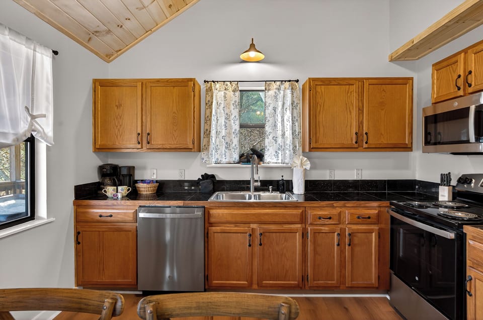 Fully equipped kitchen has everything you need for meals at home. 