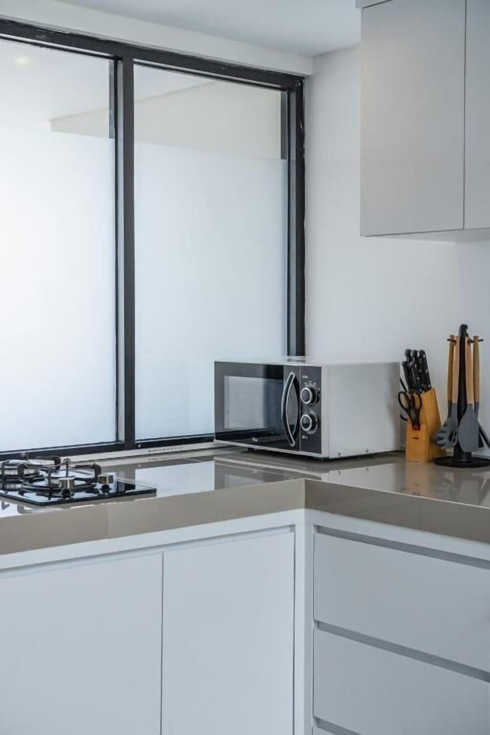 Townhome, Balcony, Courtyard View | Private kitchen | Fridge, microwave, oven, stovetop