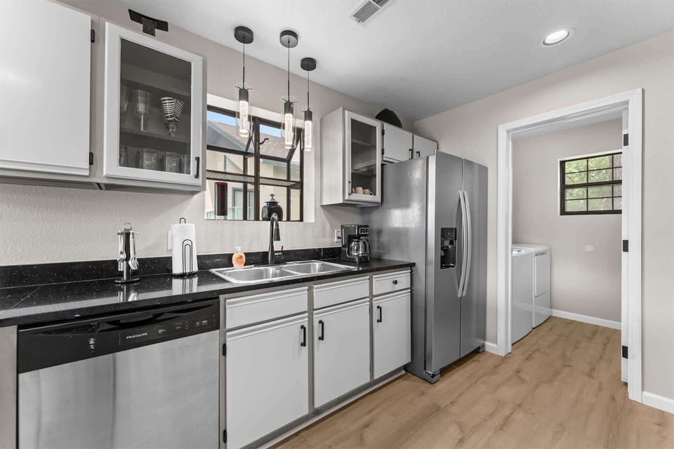 The open kitchen offers ample space & all the comforts of home​