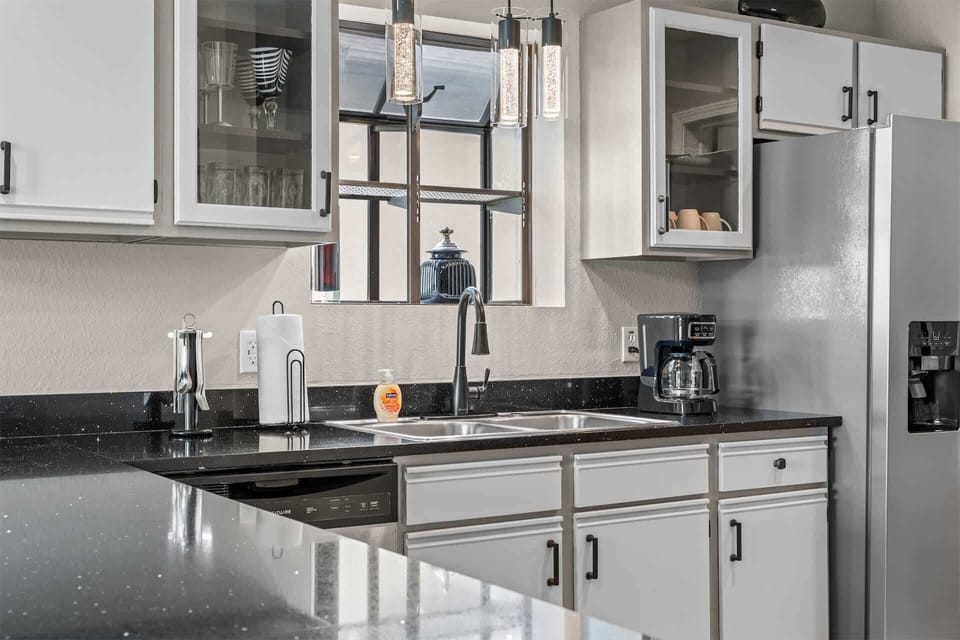 The open kitchen offers ample space & all the comforts of home​