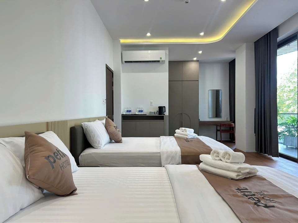 Deluxe Quadruple Room, Balcony | Laptop workspace, free WiFi
