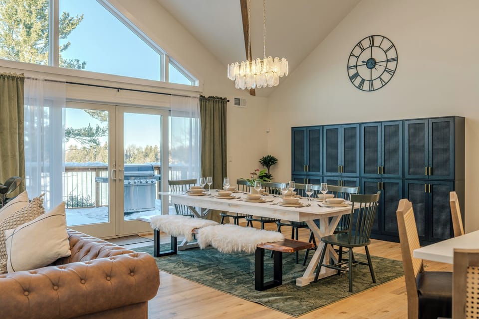 A spacious dining table set for group meals, celebrations, and slow mornings together.