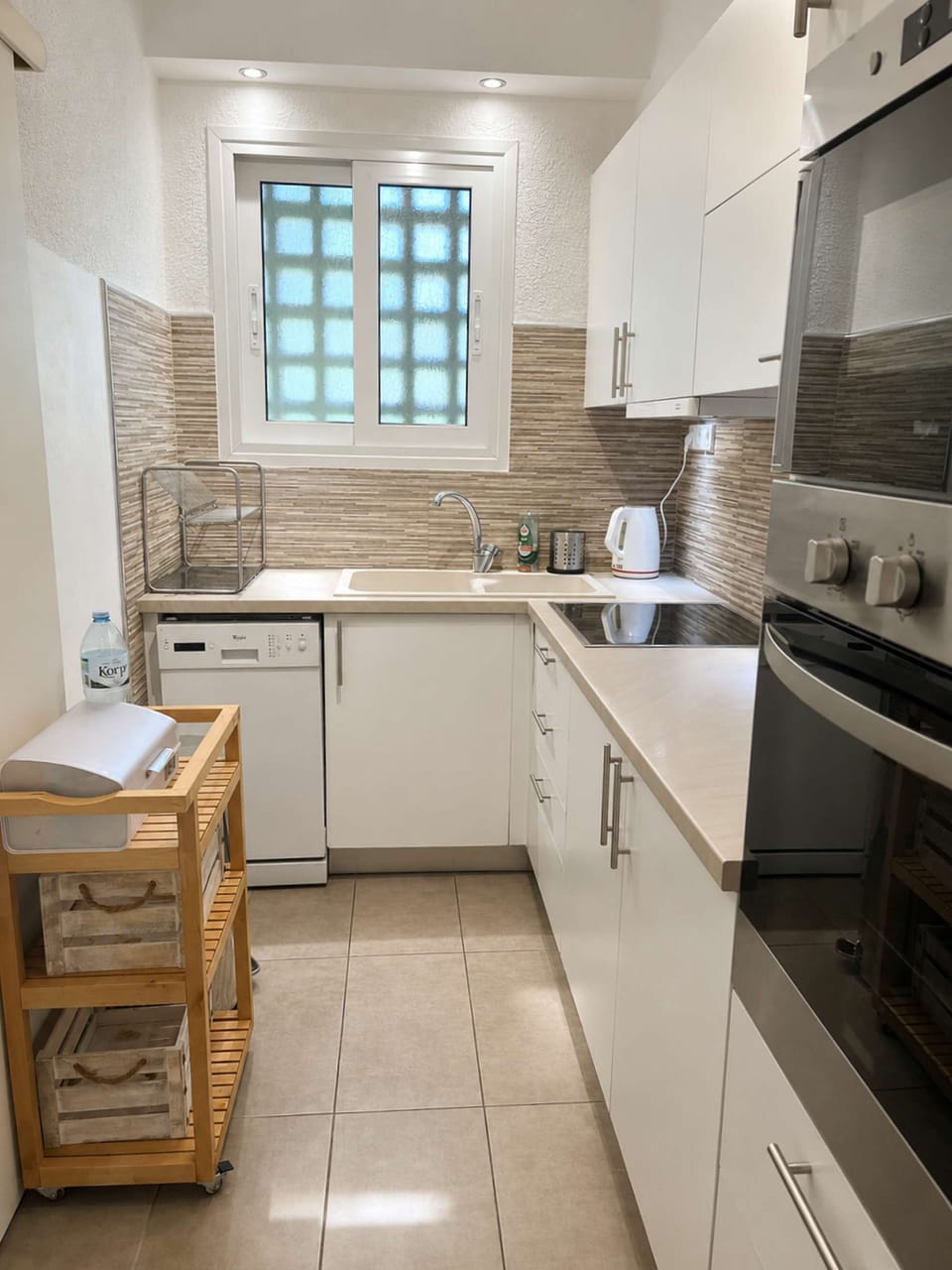 Clean lines and practical design create a kitchen space that works effortlessly throughout your stay.