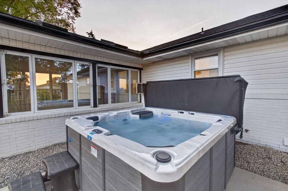 Private outdoor hot tub for relaxing evenings and cozy stays