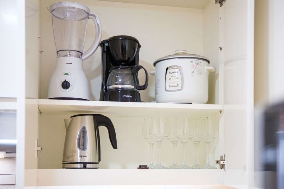 Comfort Condo, 2 Bedrooms, Kitchenette, City View | Private kitchenette | Fridge, microwave, stovetop, coffee/tea maker