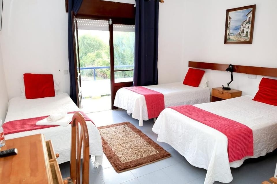 Deluxe Triple Room, Balcony, Garden View | Soundproofing, free WiFi