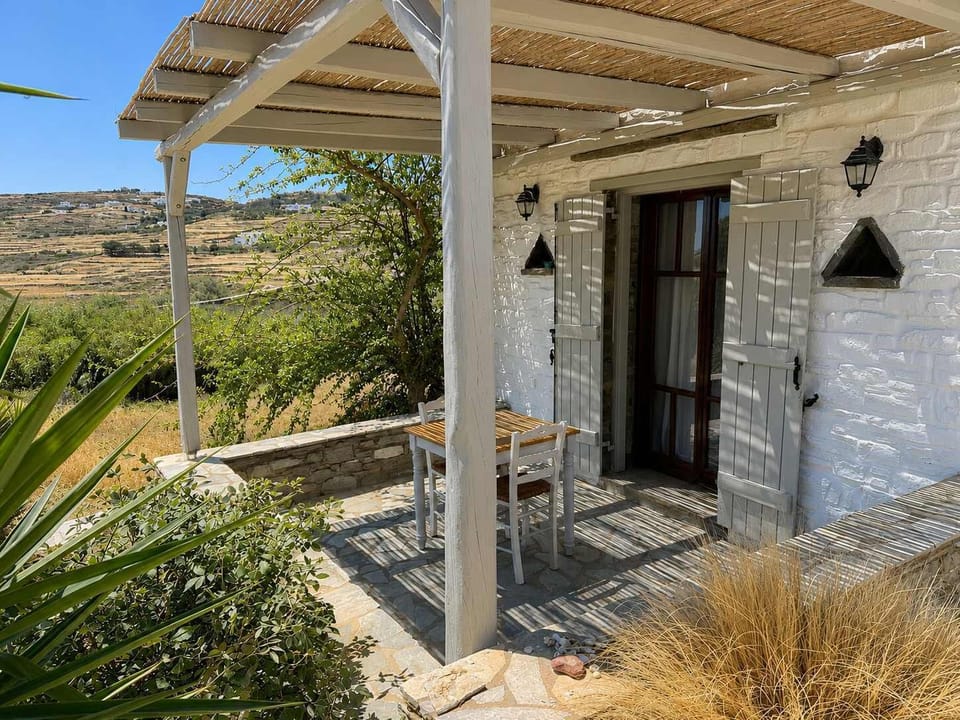 Traditional Stone House Exterior with Terrace
