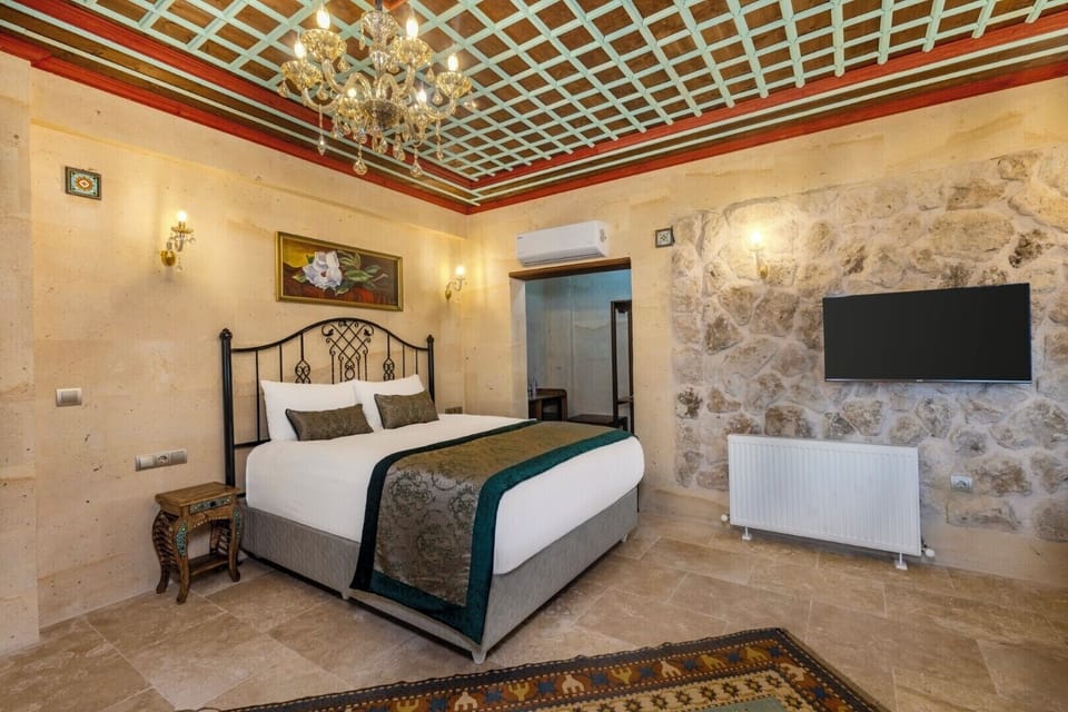 Deluxe Triple Room, Valley View | Premium bedding, minibar, blackout drapes, soundproofing