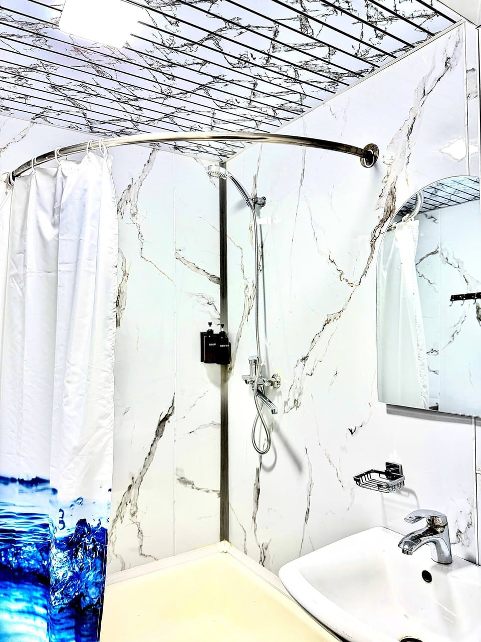 Twin Room, Lanai, City View | Bathroom | Separate tub and shower, free toiletries, hair dryer, slippers