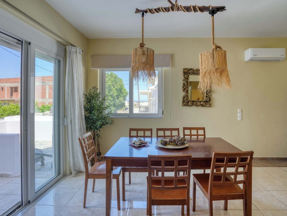 Gather around the dining table for a leisurely breakfast before heading to the beach or planning the day's adventures around Kos.