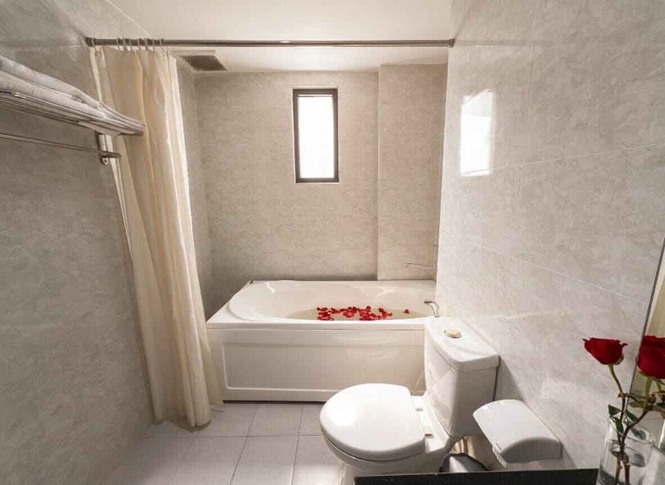 Deluxe Triple Room, Non Smoking, City View | Bathroom | Free toiletries, hair dryer, slippers, bidet