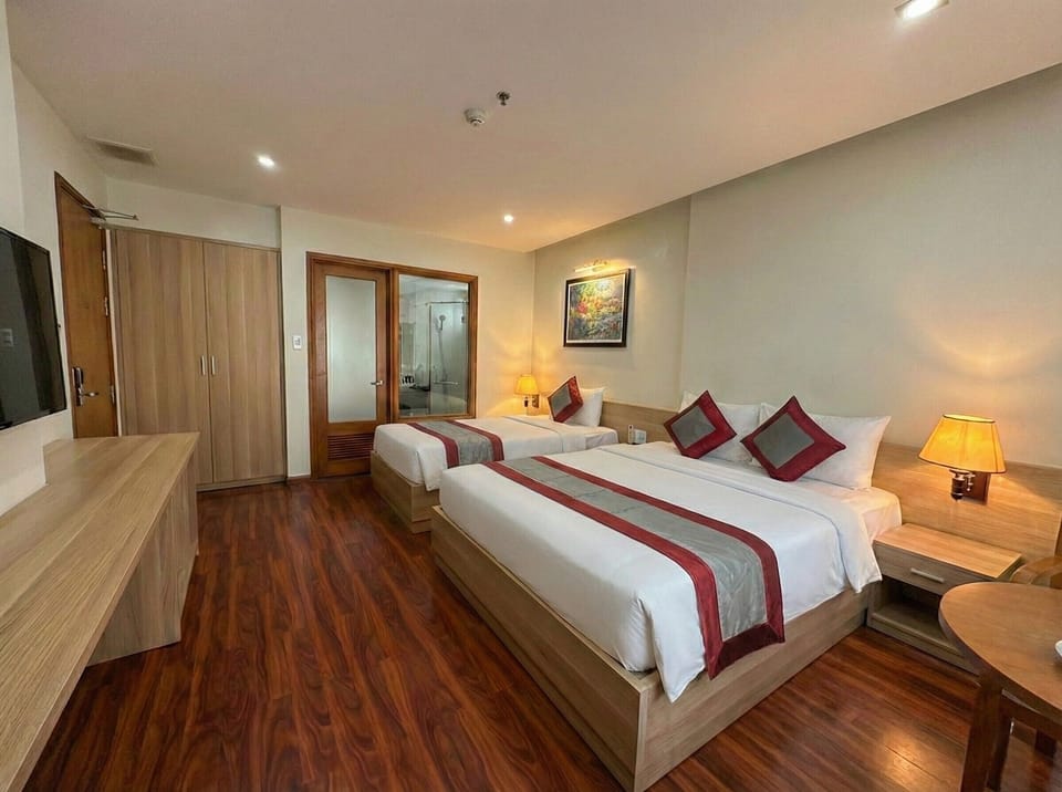 Superior Triple Room, City View | Desk, blackout drapes, free WiFi