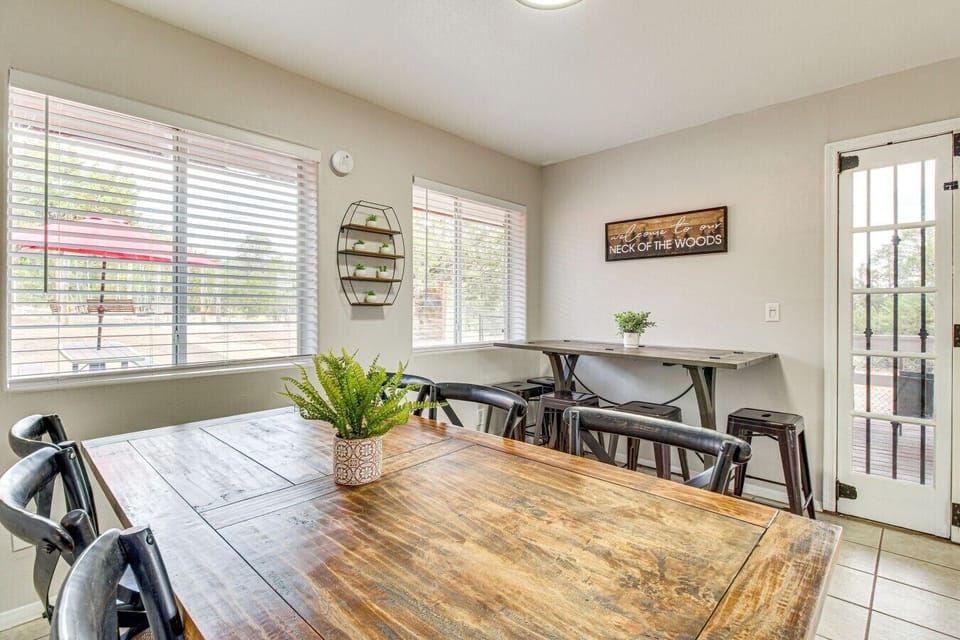 Dining Area | Rustic Dining Table | Window Lined Walls