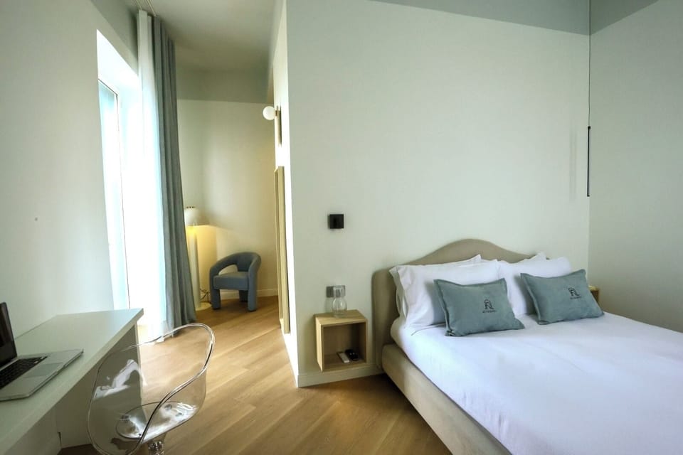 Studio Suite, City View | In-room safe, desk, blackout drapes, iron/ironing board