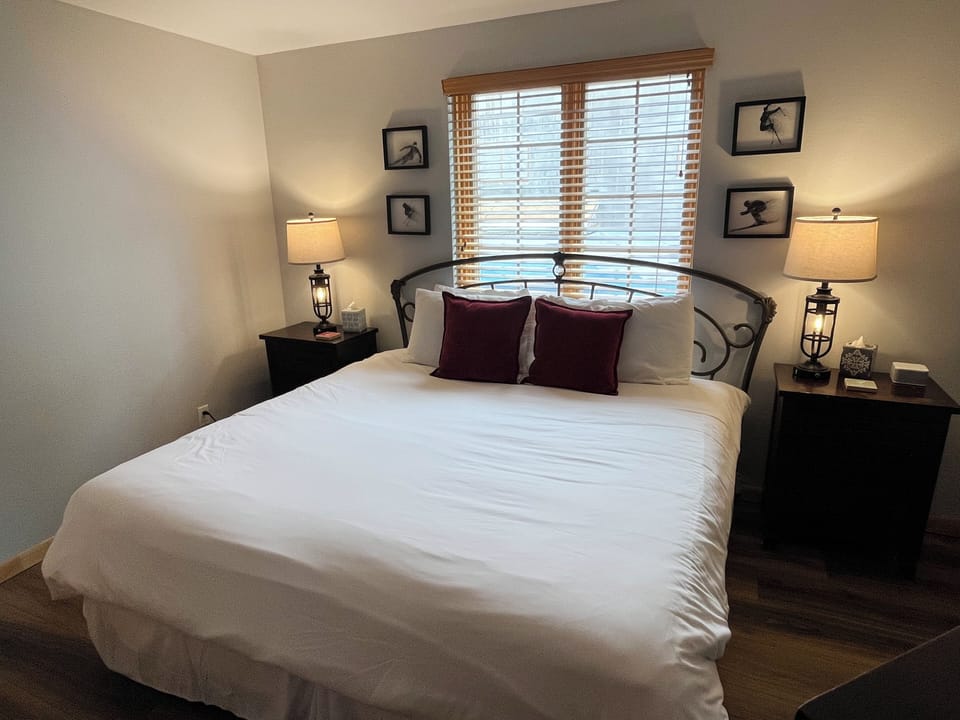 Cozy up in fresh cotton linens beneath soft lamplight after a day of adventure. We wish you a peaceful night's rest.