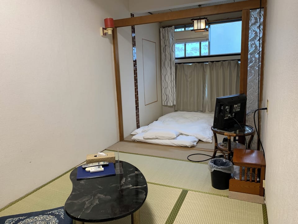 Japanese Style Twin Room with Shared Bathroom | Bed sheets