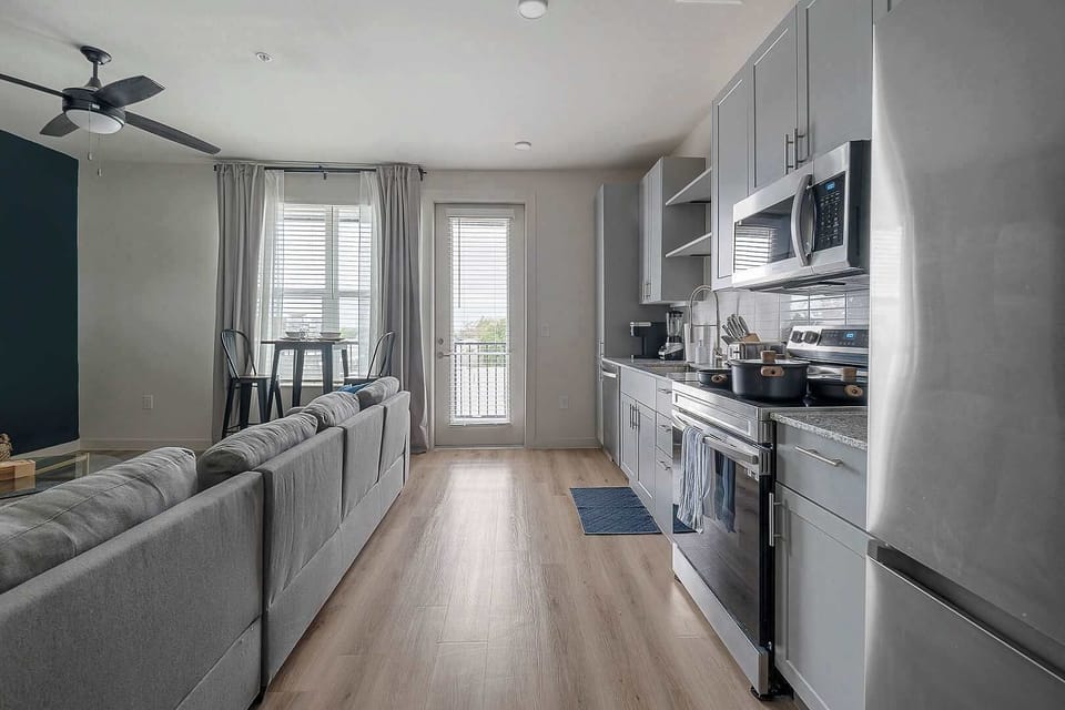 Open-concept design connecting kitchen and living