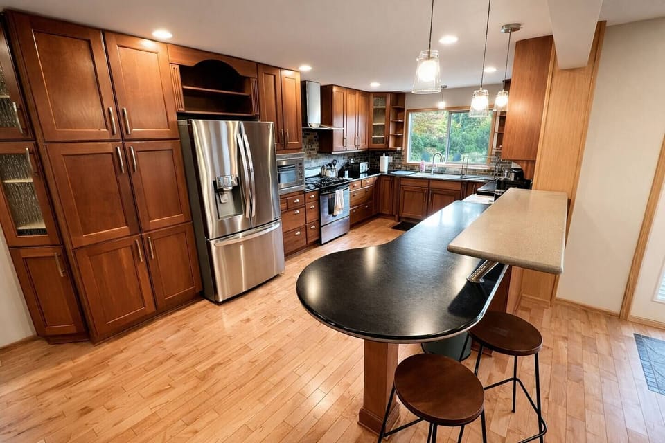 Spacious and easy to navigate kitchen. Fully equipped with most essential cooking equipment.