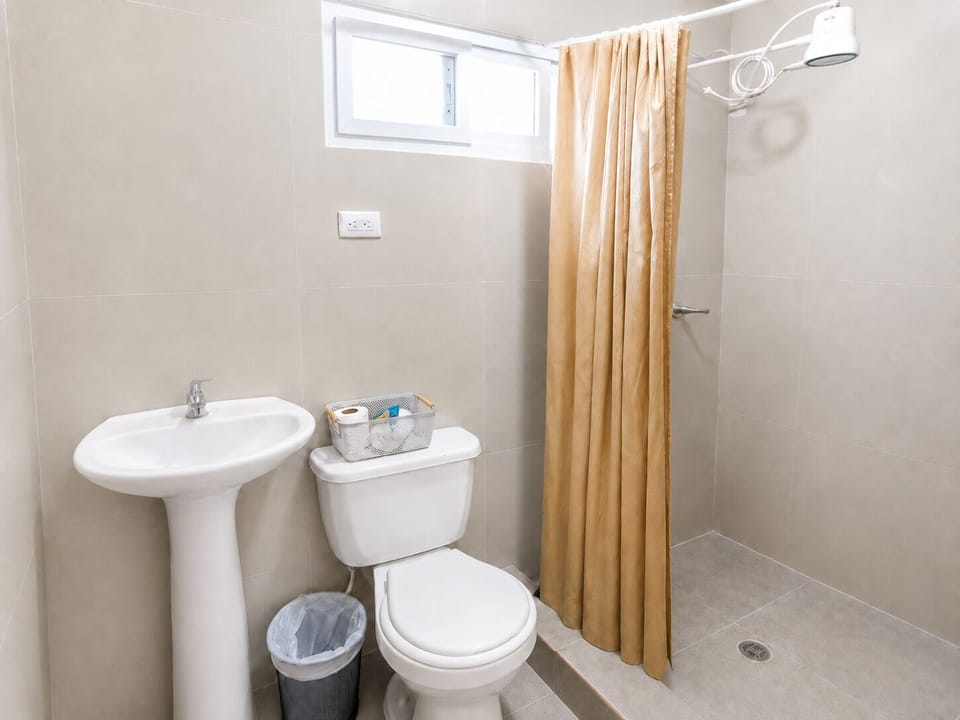 Comfort Single Room | Bathroom | Shower, towels, soap, shampoo