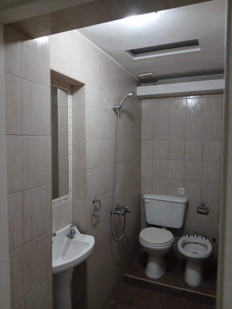 Shower, towels, toilet paper