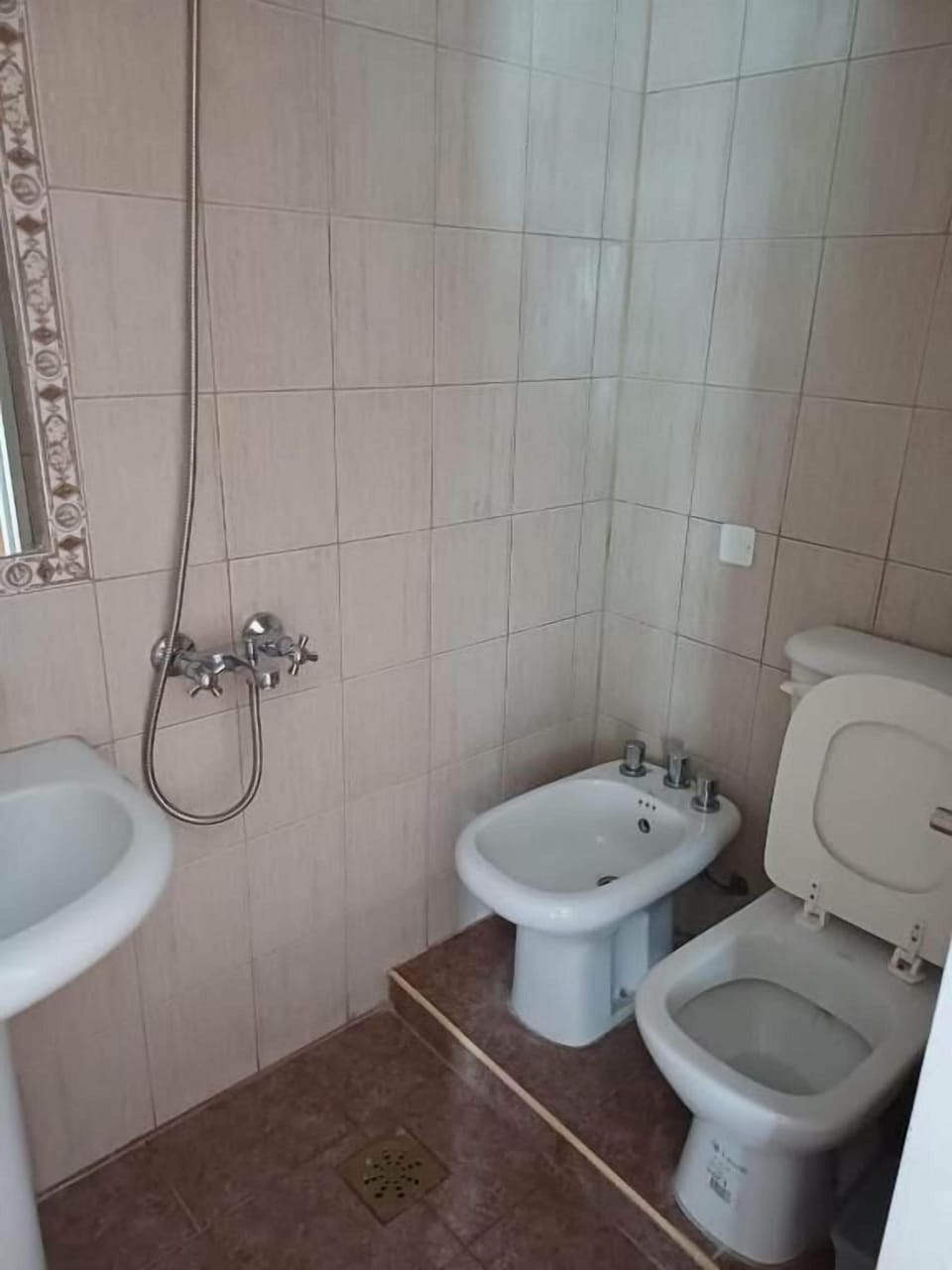 Shower, towels, toilet paper