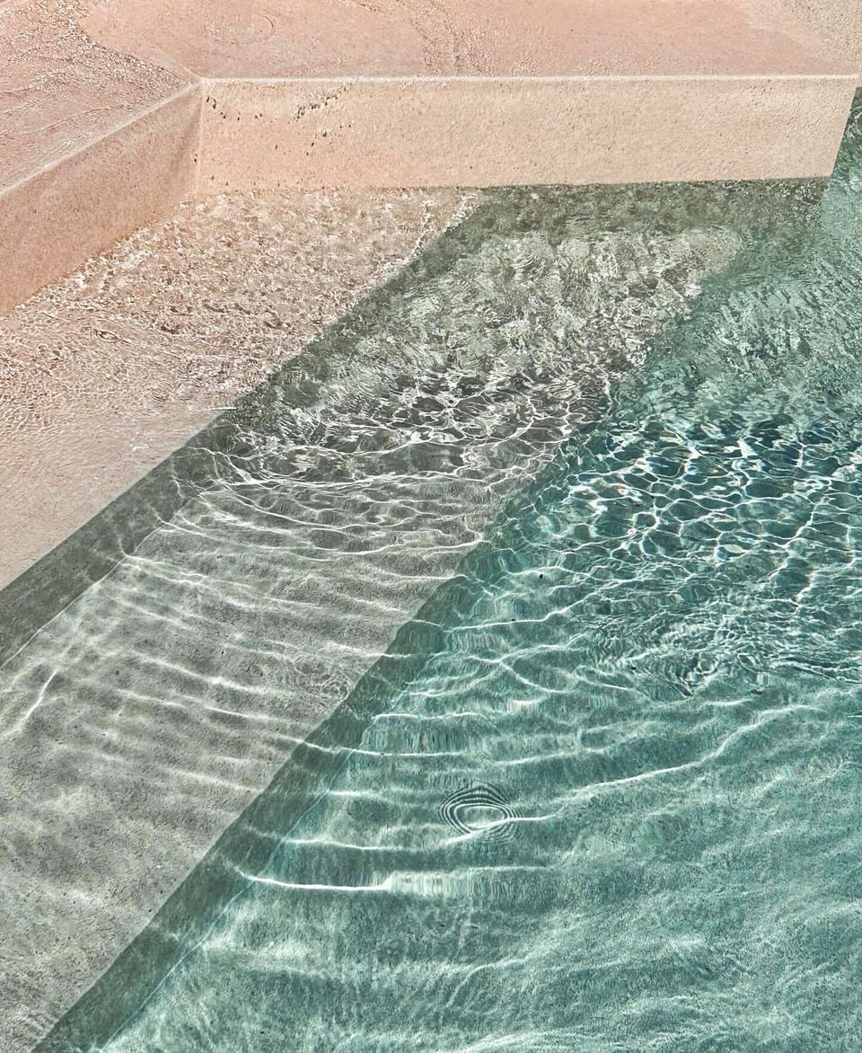 Seasonal outdoor pool, open 10:00 AM to 8:00 PM, pool umbrellas