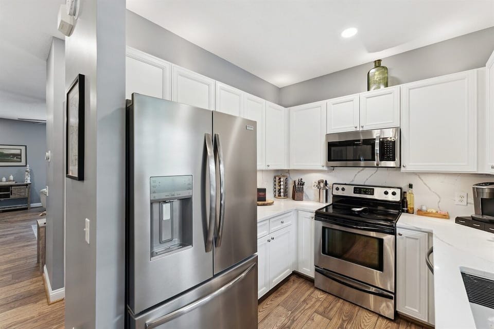 Fully equipped with stainless steel appliances for easy meal prep.