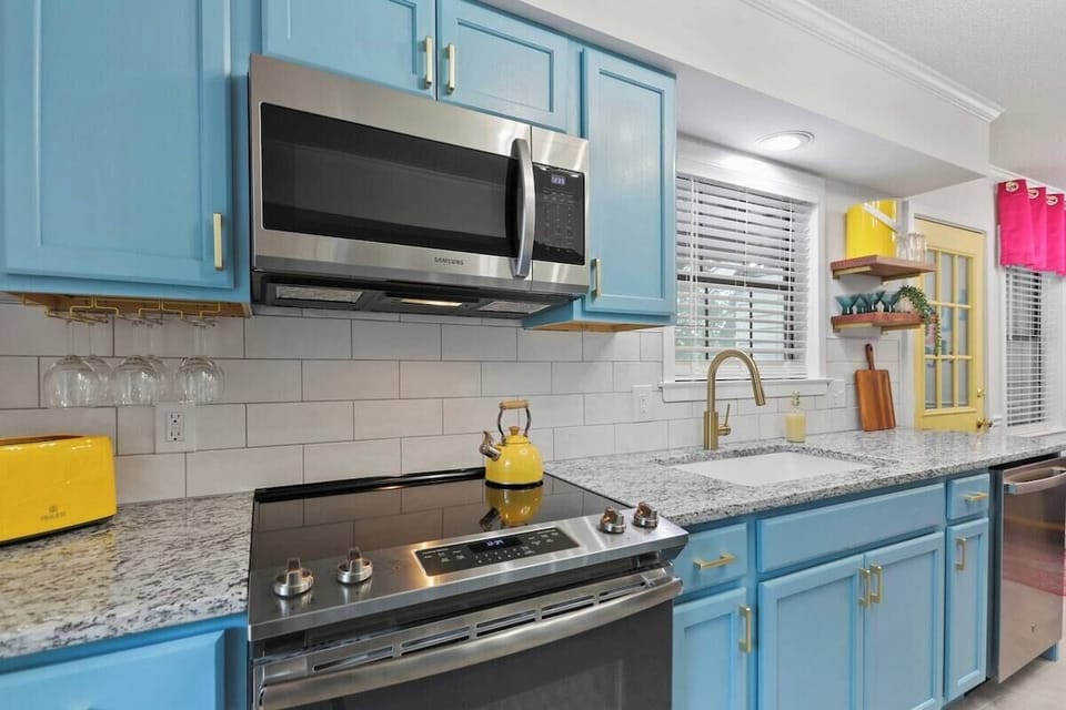 This kitchen brings the color and the charm.