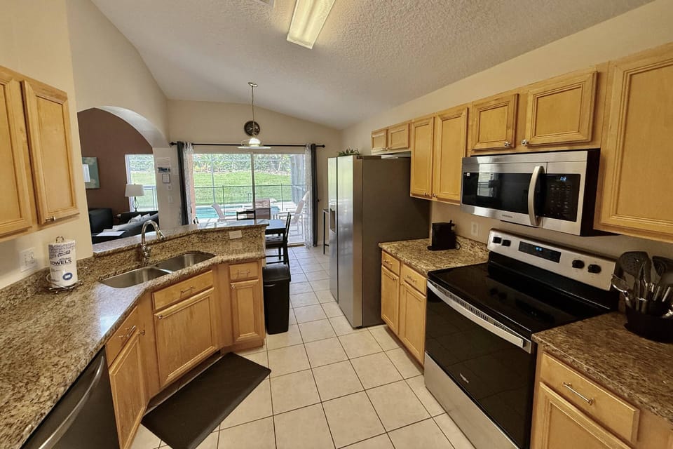 Fully Equipped kitchen with granite counters and stainless steel appliances
