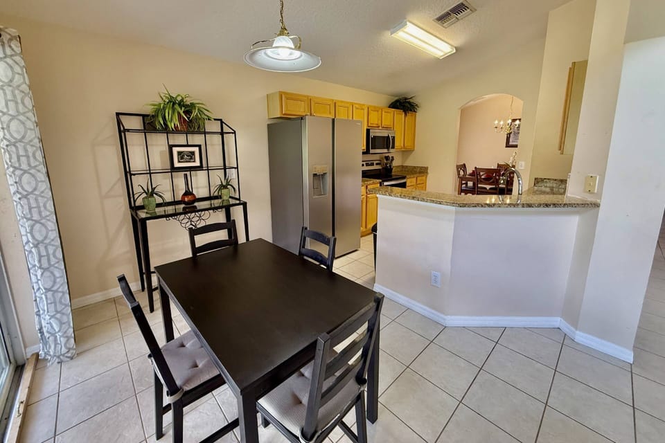 Kitchen and secondary dining area