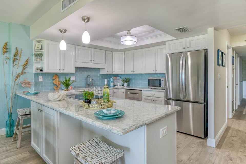 The gourmet kitchen is fully stocked with everything you needs to prepare your favorite foods and drinks.
