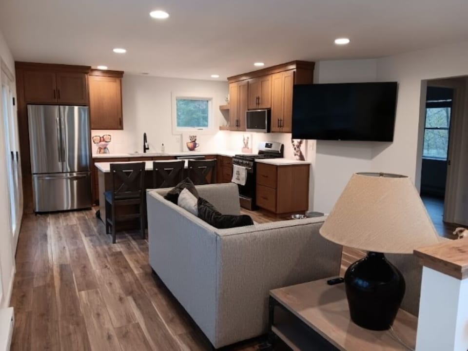 Upper apartment over garage kitchen/ Livingroom. large deck out front. 