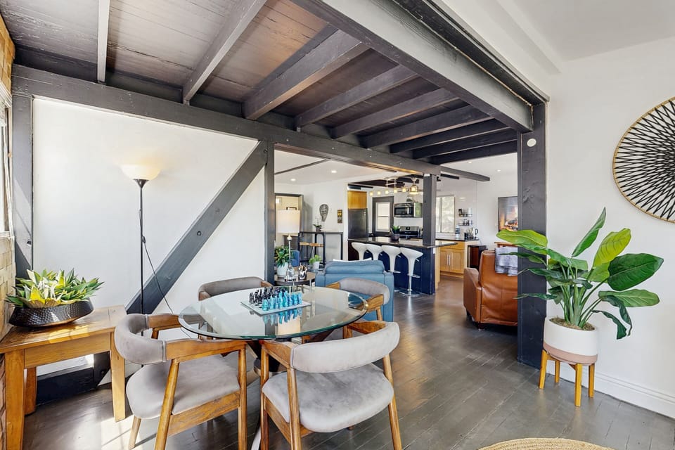 Located just off of the entryway is a dining area for 4 guests.