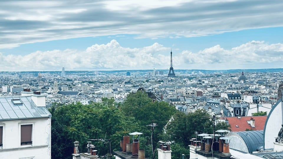 Top-floor panorama over Paris  Rare open views from a sixth-floor apartment in Montmartre.