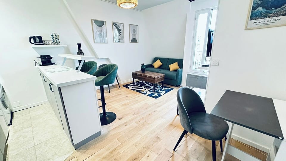 Open-plan living and dining space  Modern layout combining kitchen, dining area, and lounge.